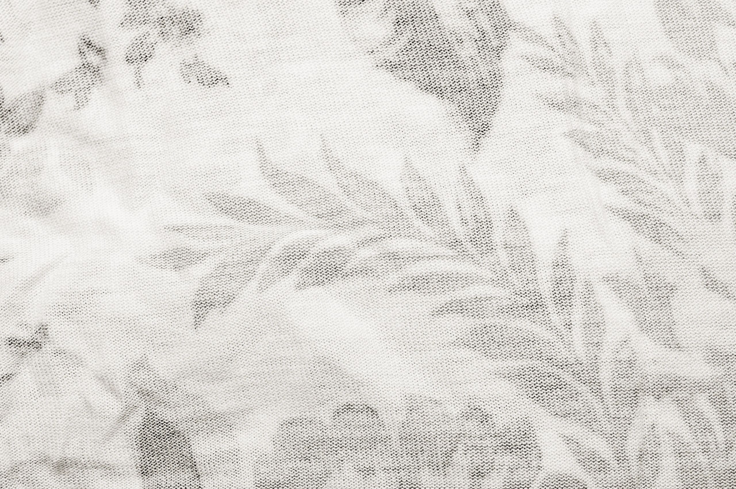 Organic cotton fabric detail in neutral tones
