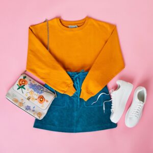 Flat Lay Shot Of Female Parisian Style Clothing And Accessories